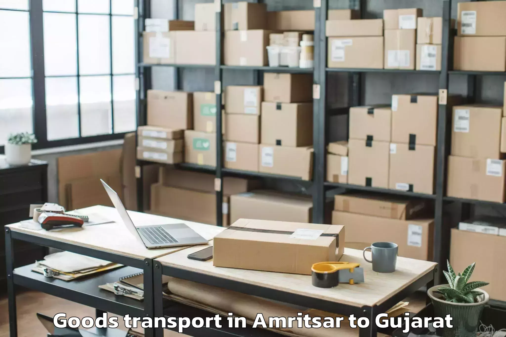 Top Amritsar to Vatadara Goods Transport Available